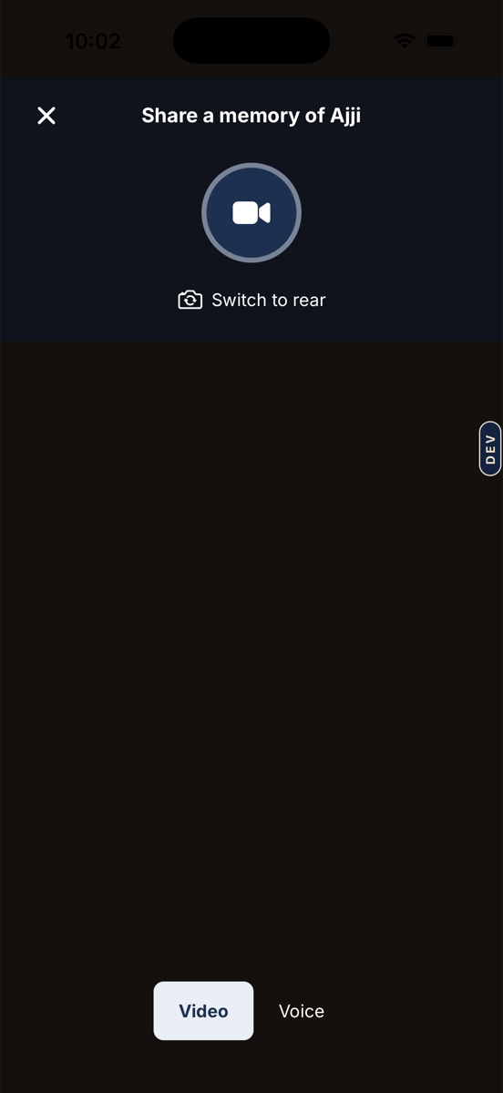 The Share a memory screen: a round record button, Switch to rear, and a Video or Voice choice at the bottom.